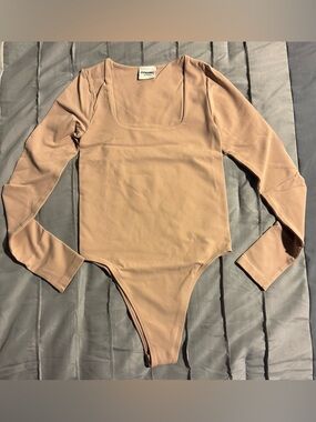 Dynamic Long-Sleeve One-Piece Bodysuit